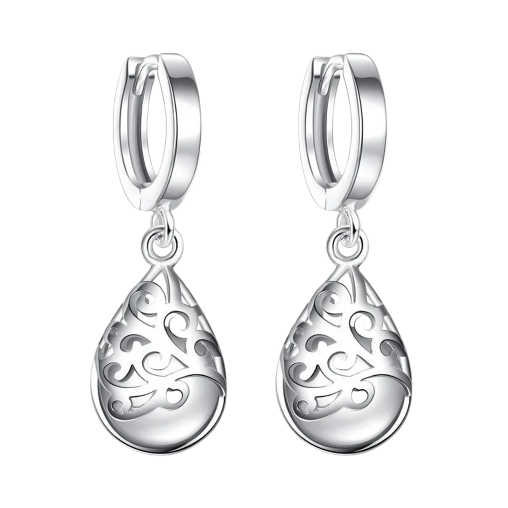 (b) Boucle d'oreille Soraya White